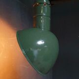 Old industrial enamel lamp in green