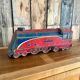Old tin locomotive Eclair 404