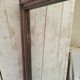 Large wooden and plaster mirror