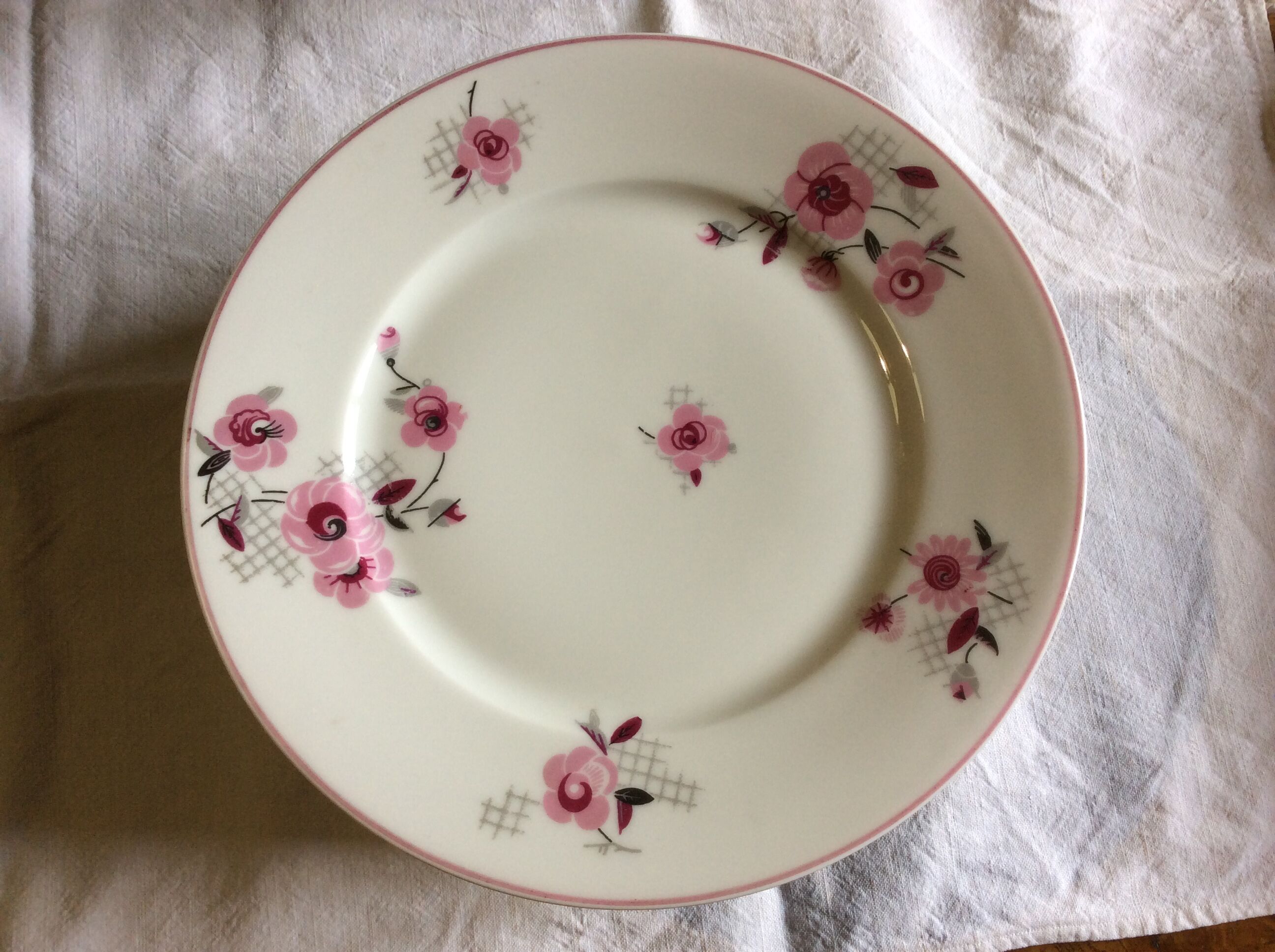 22 flat plates Limoges porcelain, flowers
