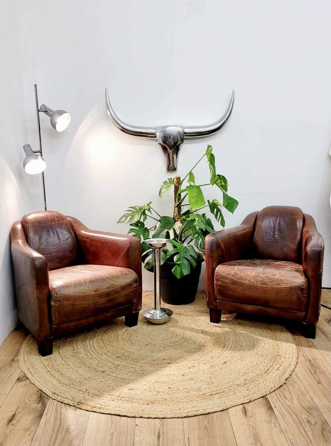 Pairs of vintage leather club armchairs