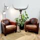Pairs of vintage leather club armchairs