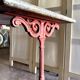Grey marble and burgundy cast iron bistro table ☐ 85 x 57 cm