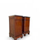 A pair of antique walnut bedside tables from the 1890s.