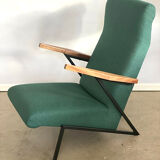 Lounge or easy chair with armrests