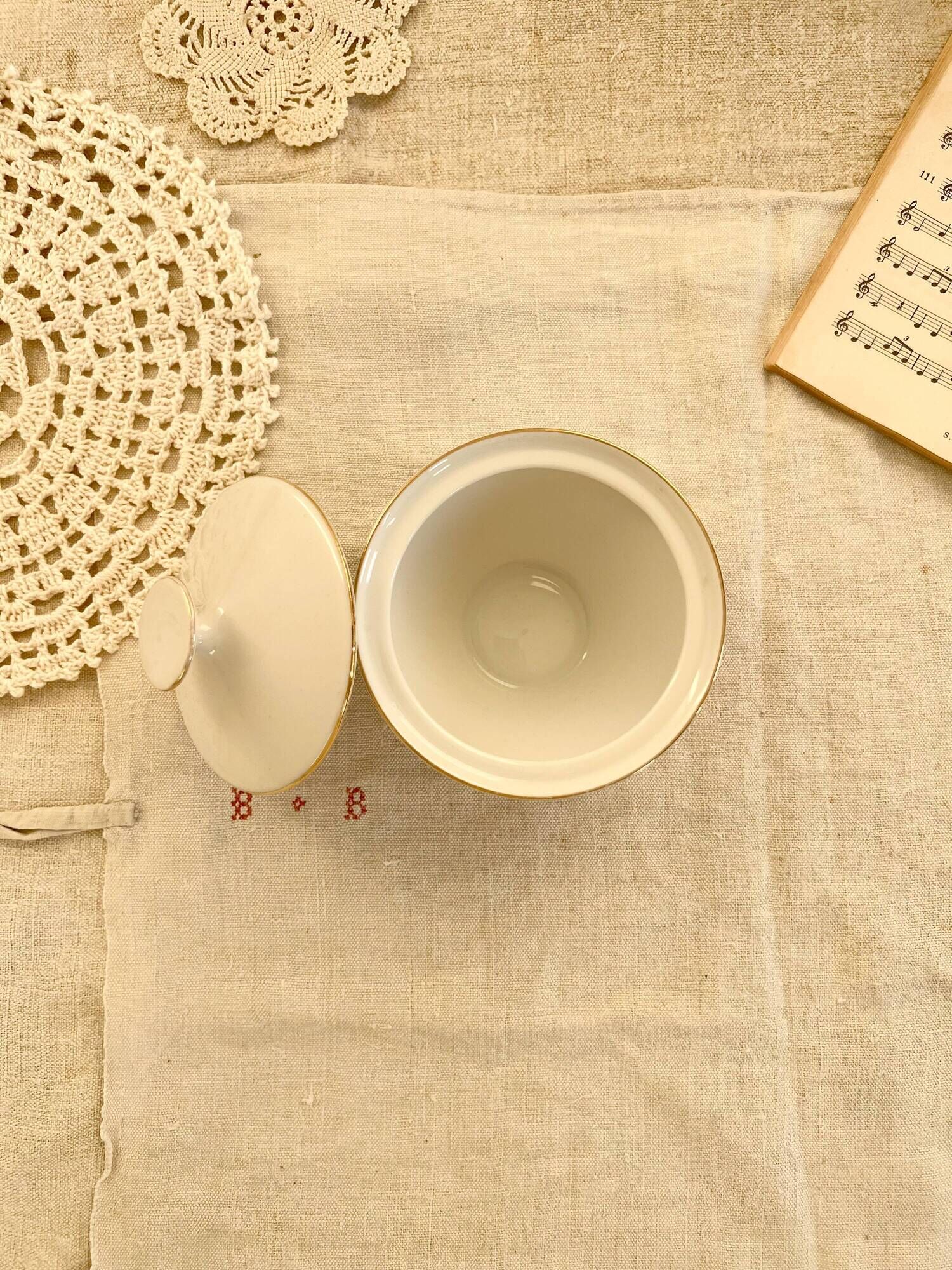 Vintage white porcelain sugar bowl and cottage core floral pattern