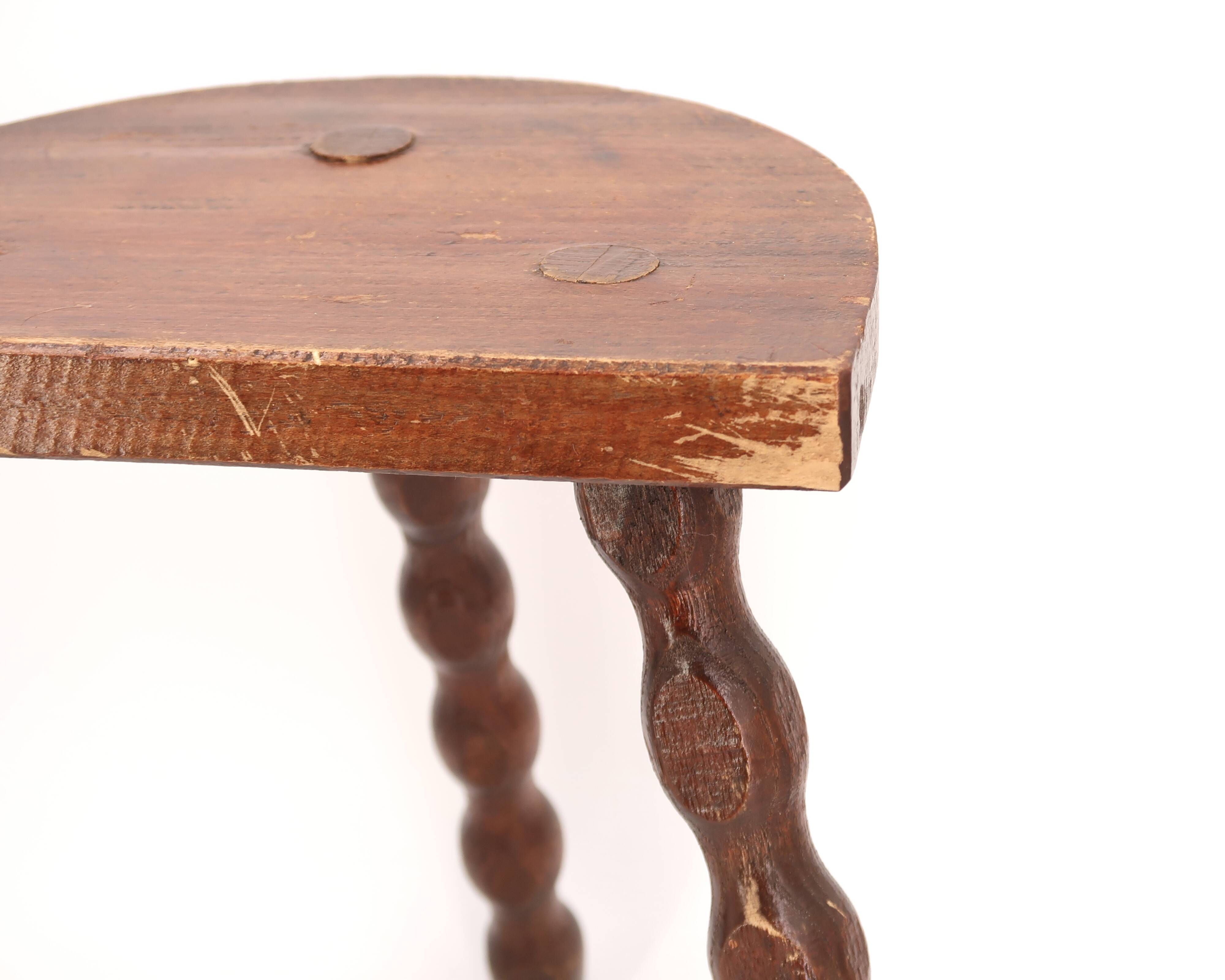 Wooden tripod stool, half-moon seat, 1950s