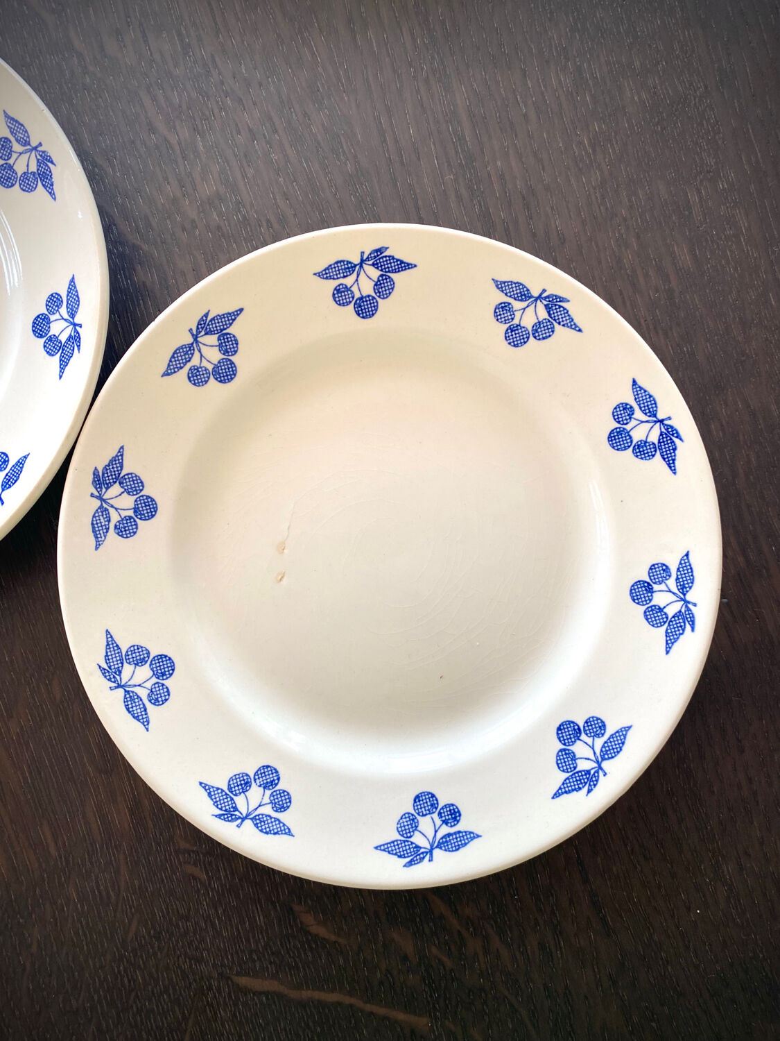 Set of eight dessert plates – blue cherry patterns – stamped