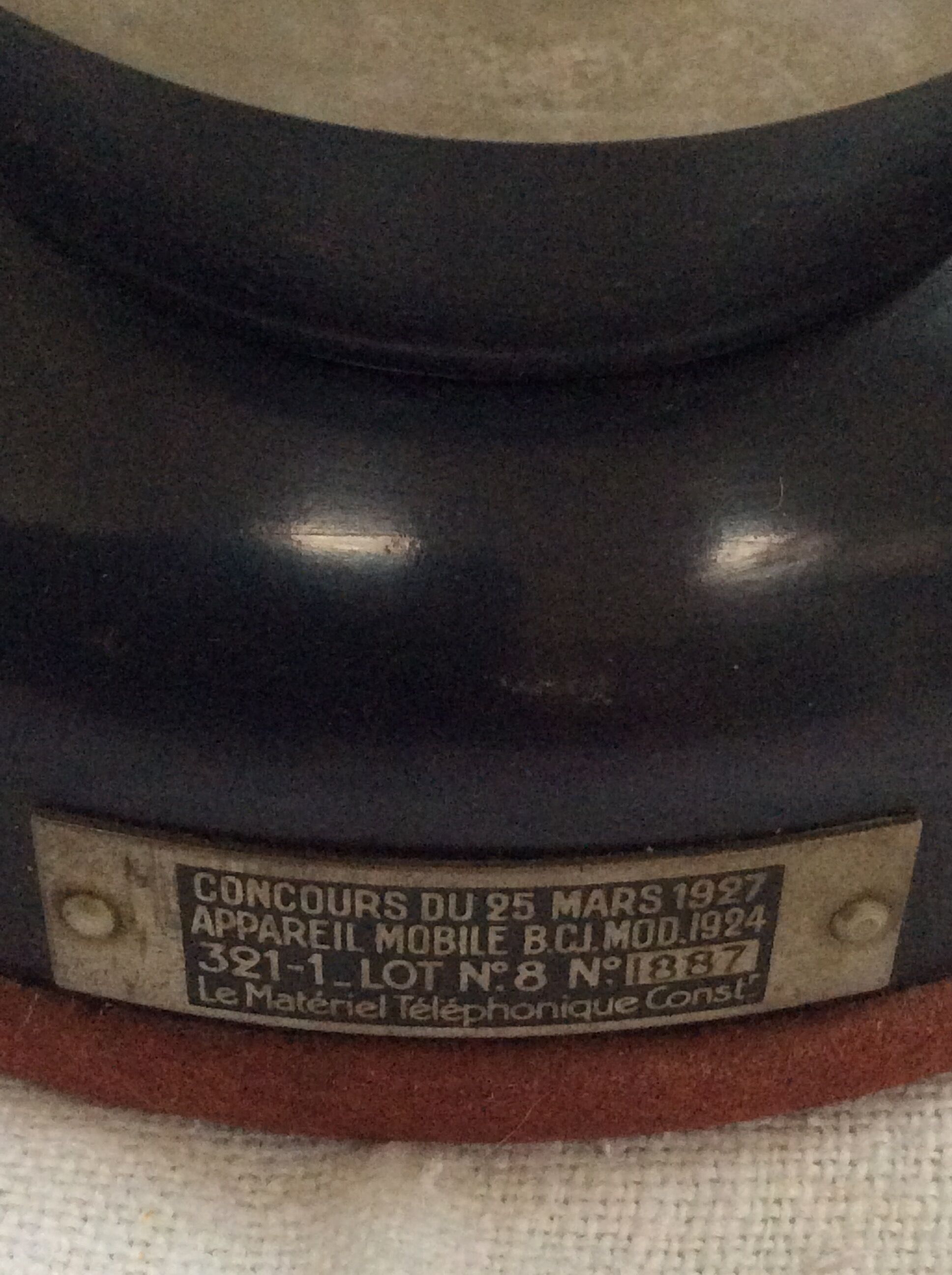 Old Bakelite telephone with column