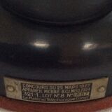 Old Bakelite telephone with column