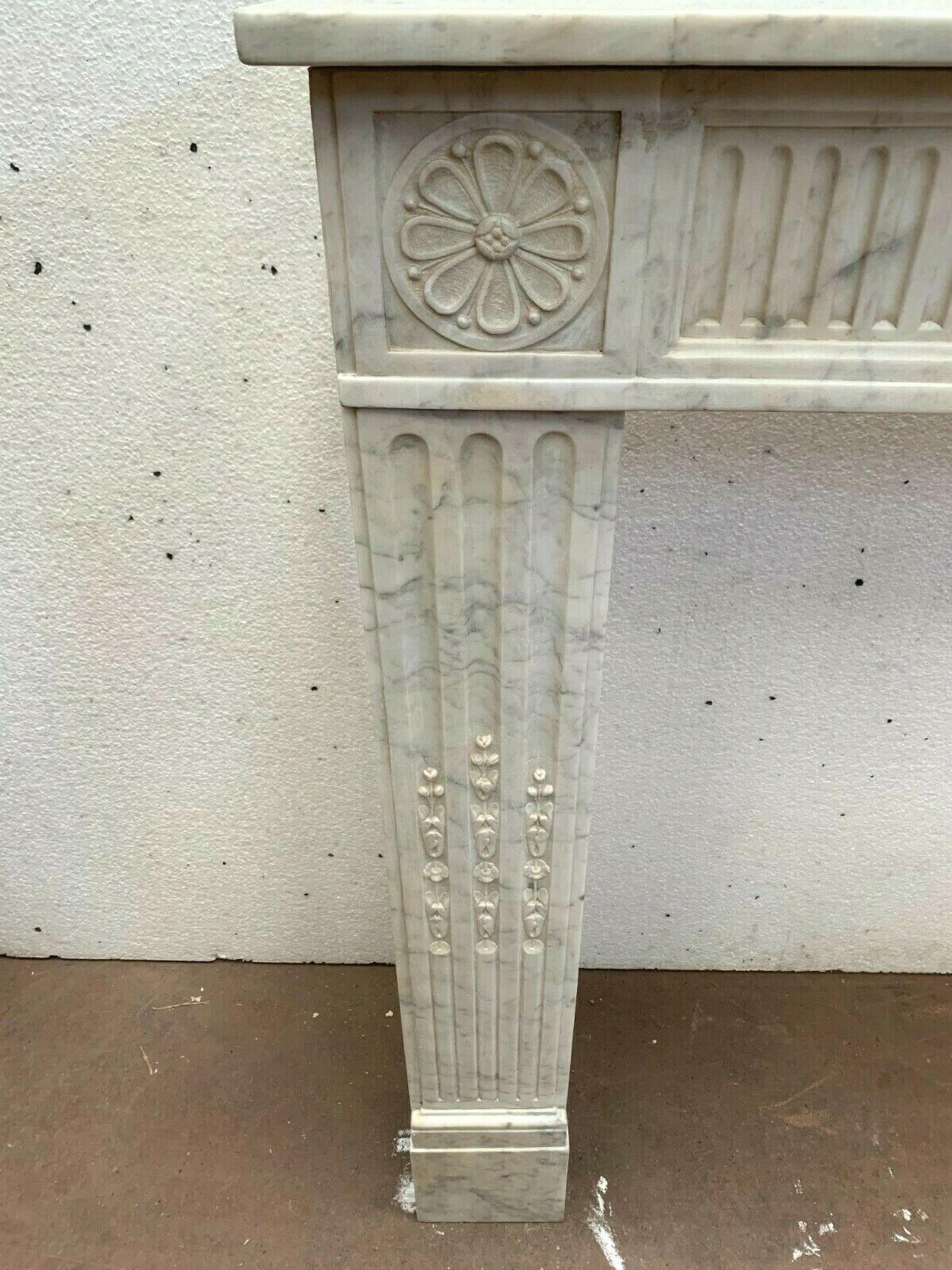 Louis XVI fireplace in 19th century white Carrara marble