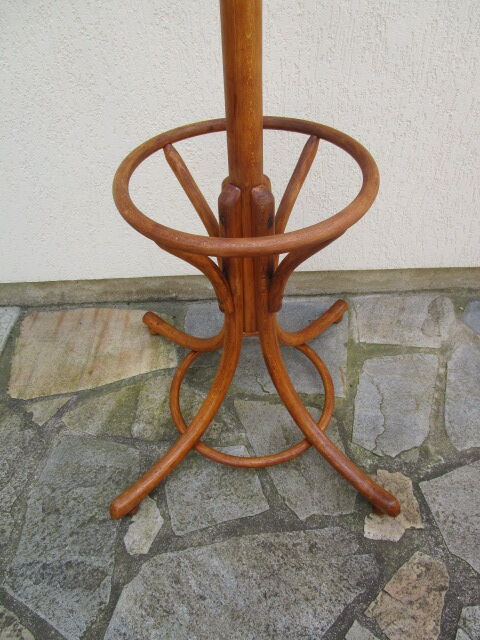 Antique parrot coat rack in blond wood