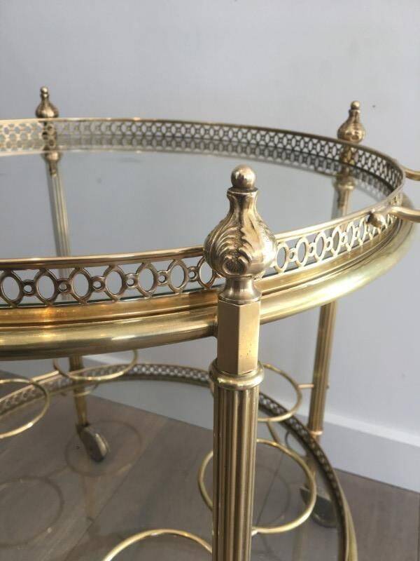 Round brass rolling table attributed to Maison Jansen