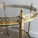 Round brass rolling table attributed to Maison Jansen