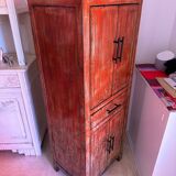 Asian style high sideboard in coral colored wood