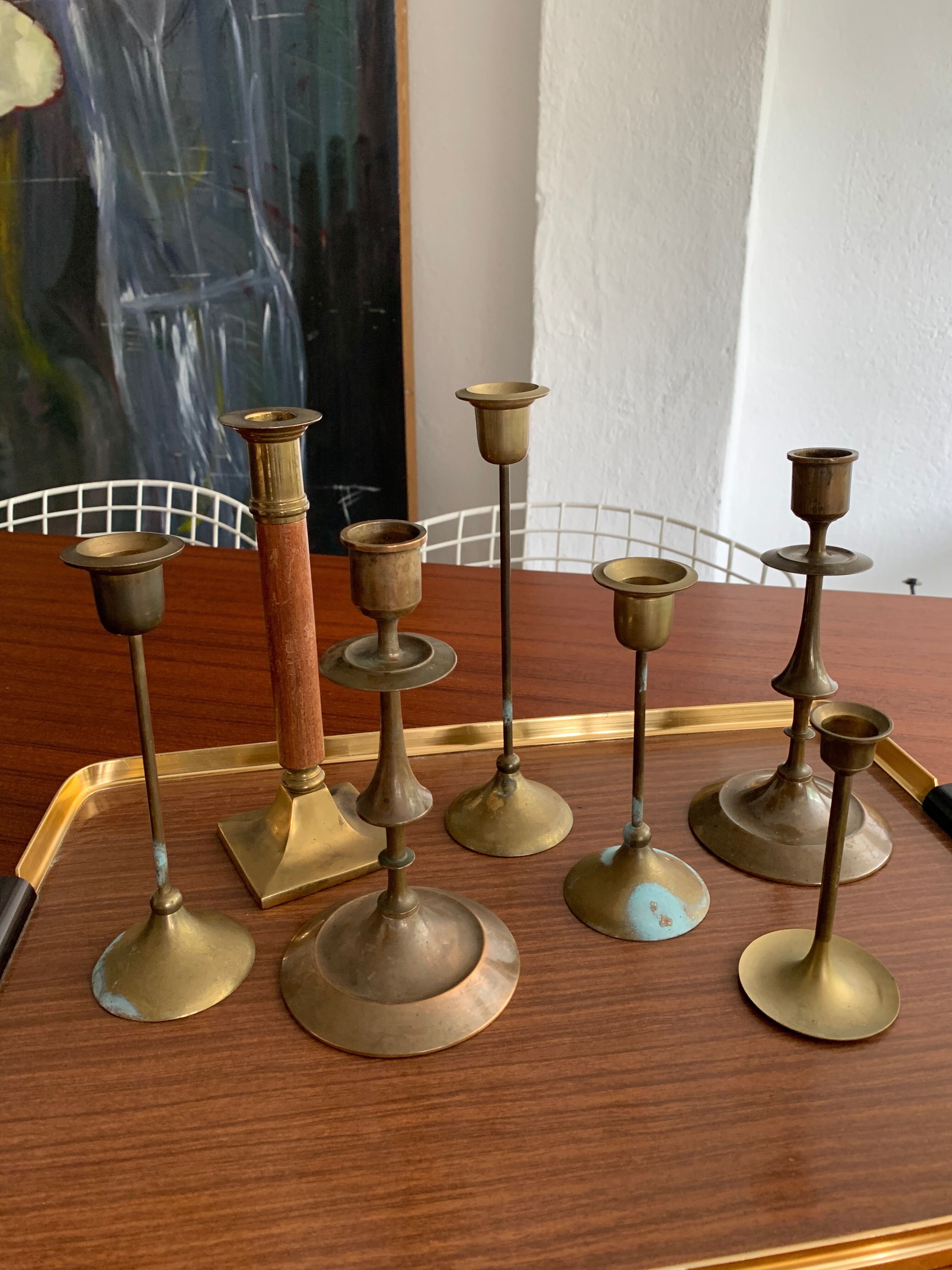 Set 7 mismatched brass and bronze candlesticks