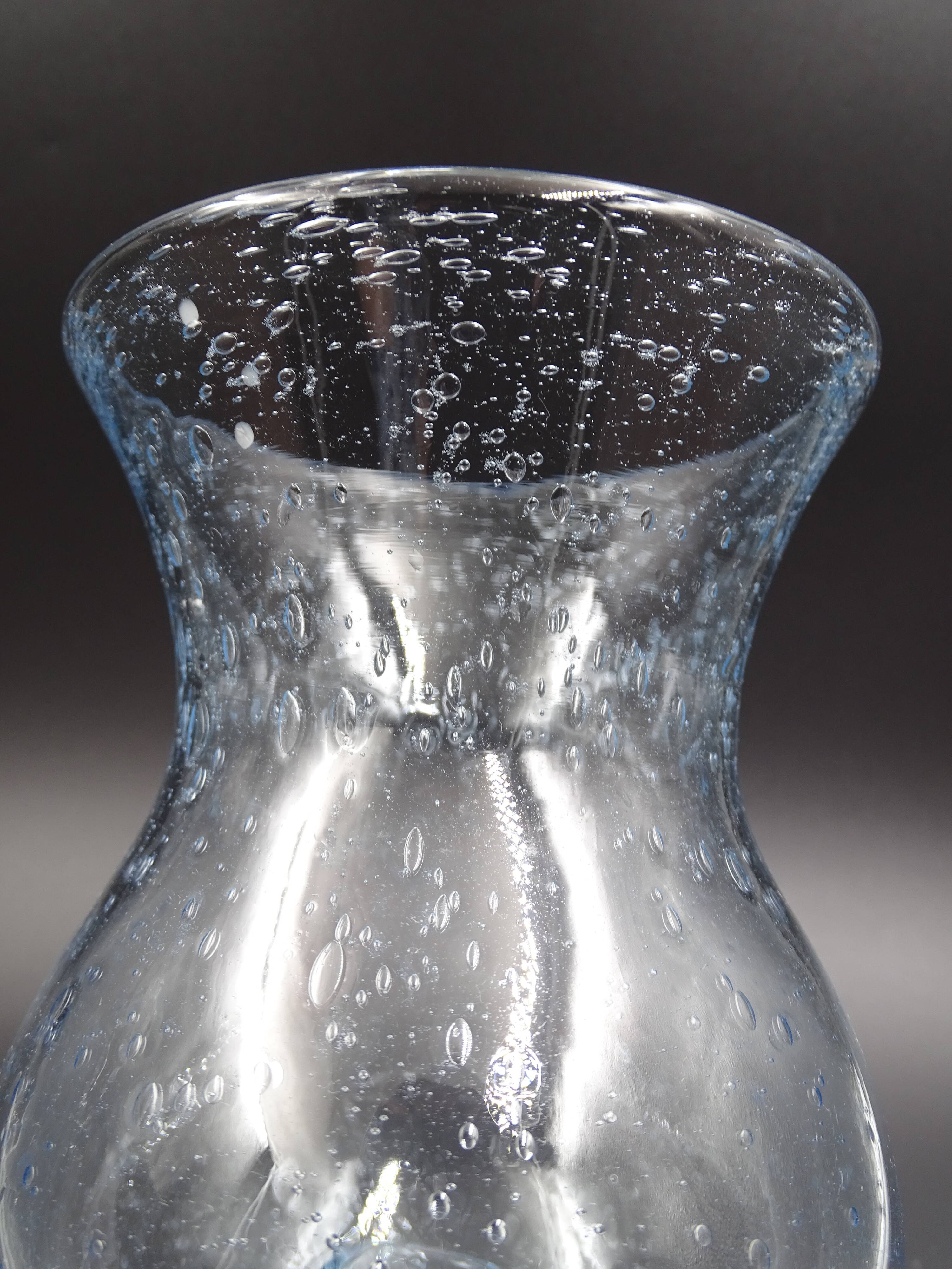 Candlestick or photophore in sky blue bulled glass, signed Biot