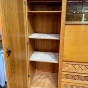 Wardrobe, desk, wooden and rattan chest of drawers, 1960s.