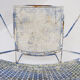 Vintage perforated metal armchair from the 1950s.