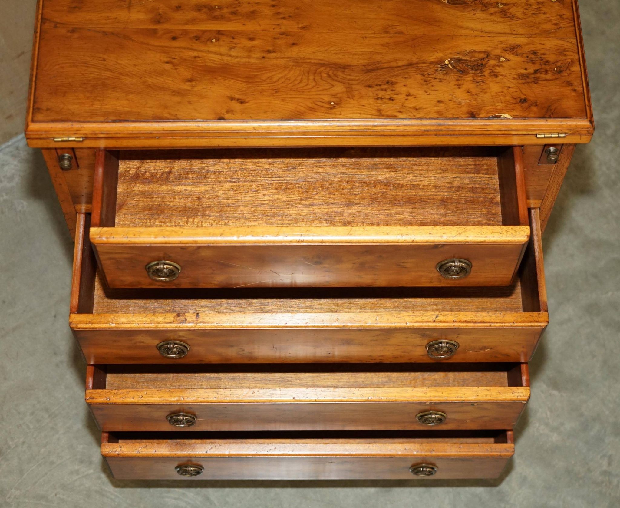 Vintage walnut commode with sliding top in Butler style.