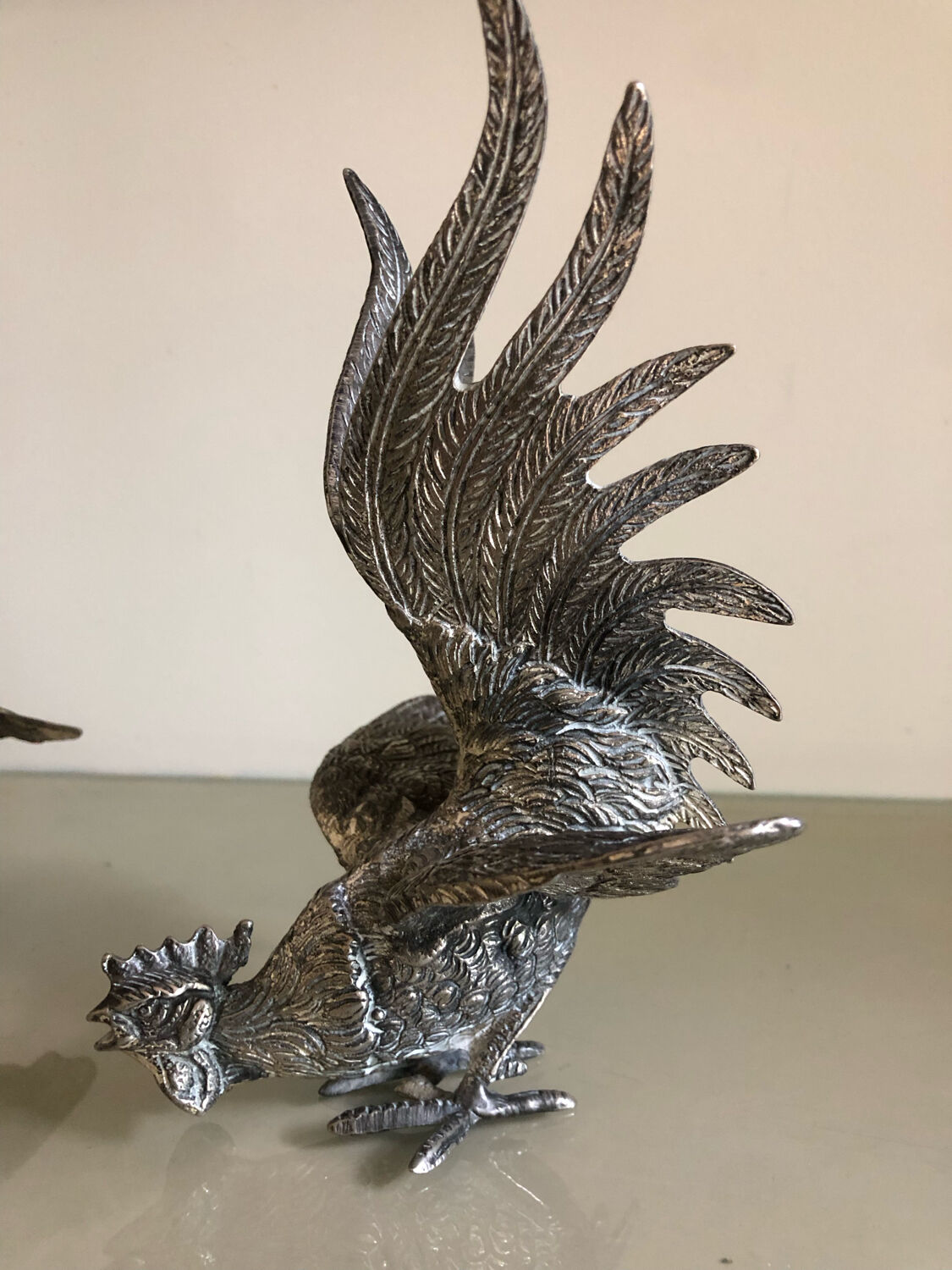 Vintage silver metal roosters