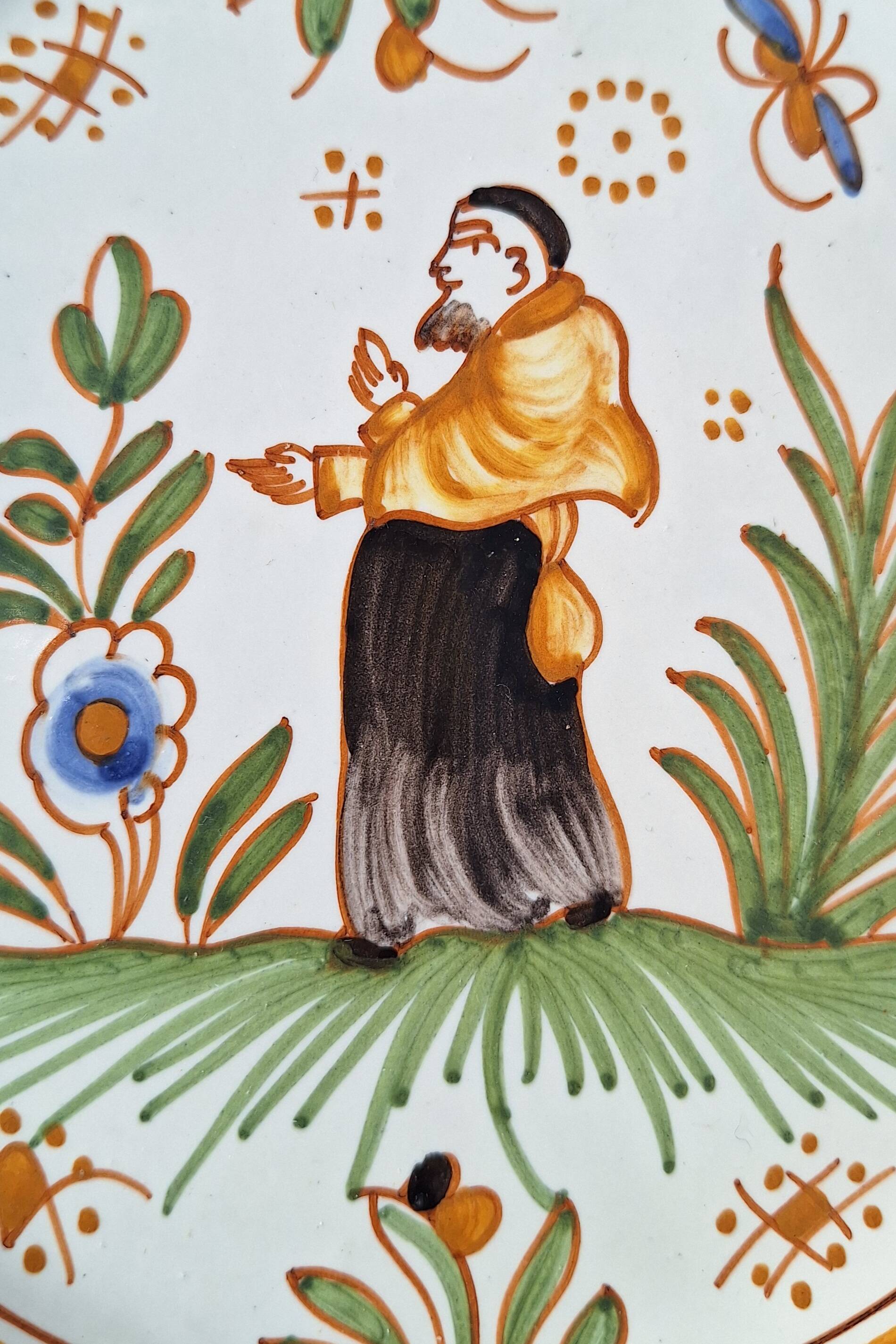 Earthenware plate with Moustiers decoration