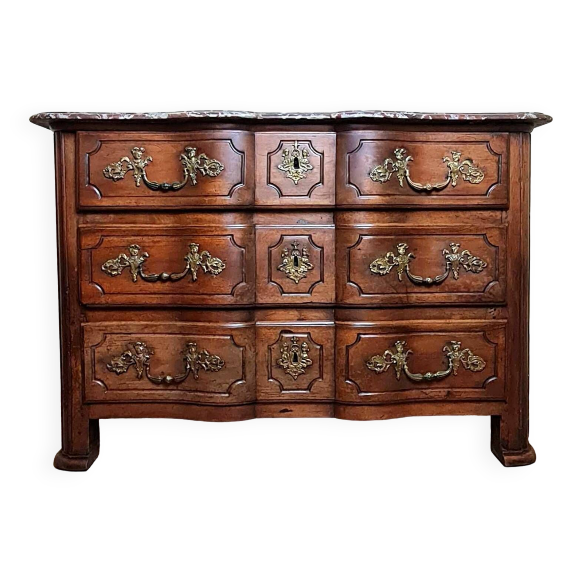 Louis XIV period Arbalette chest of drawers in solid walnut circa 1700