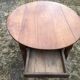 Louis Philippe oval drop-leaf table in solid cherry wood with 2 drawers.
