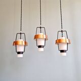 Trio of Scandinavian pendant lights in opaline and copper metal, 1960s