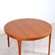 Round dining table in teak by Ib Kofod Larsen for Faarup Mobelfabrik