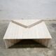 Series of 2 vintage travertine coffee tables published by Roche Bobois