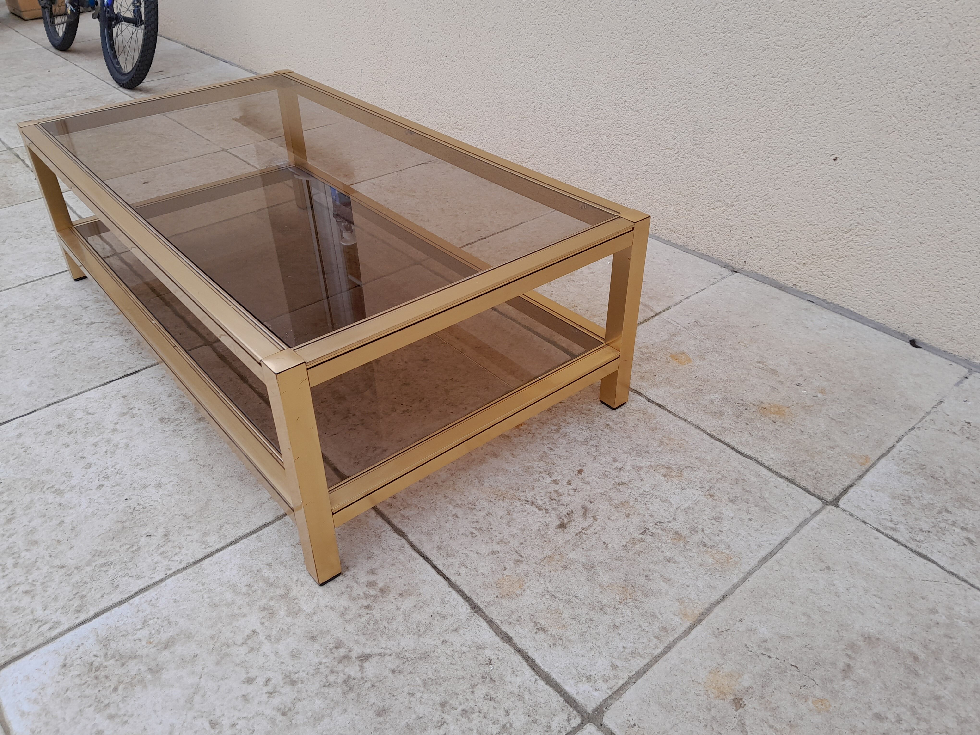 Table basse rectangulaire dorée année 70