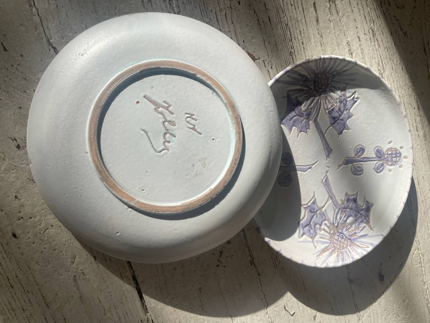 Pair of blue thistle plates