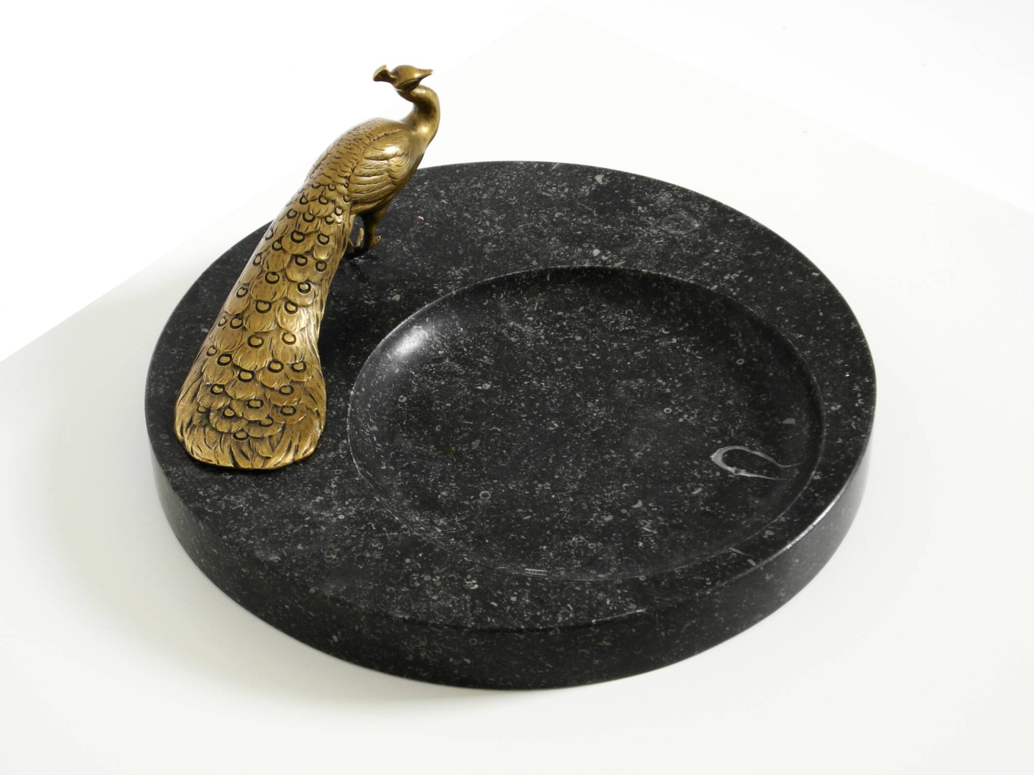 Beautiful, large black granite valet tray featuring a brass peacock, circa