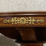Art Deco pedestal table in mahogany and gilded bronzes around 1920