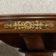Art Deco pedestal table in mahogany and gilded bronzes around 1920
