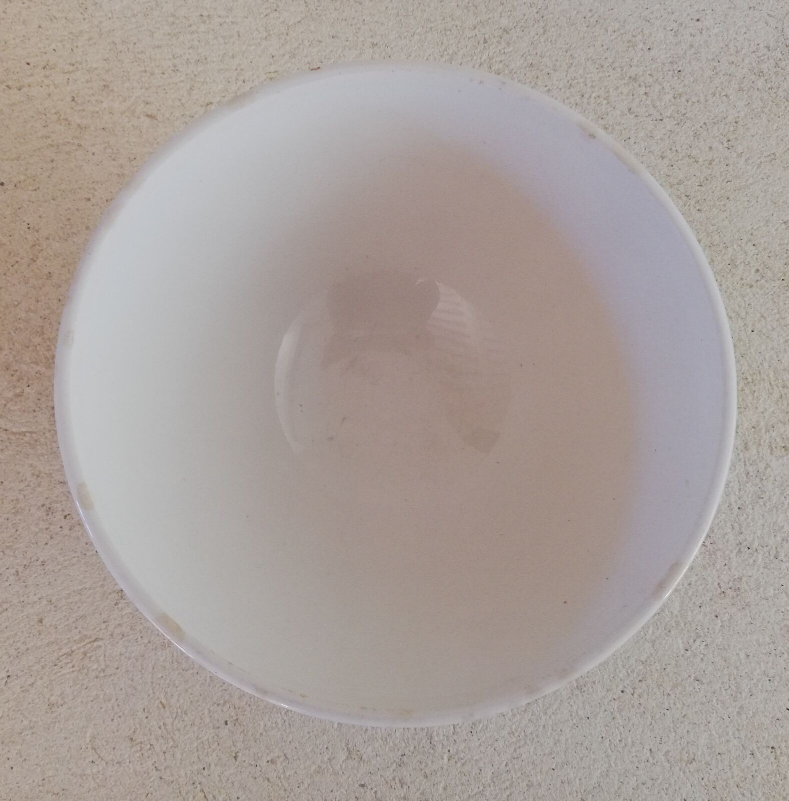 Old faceted iron earth bowl