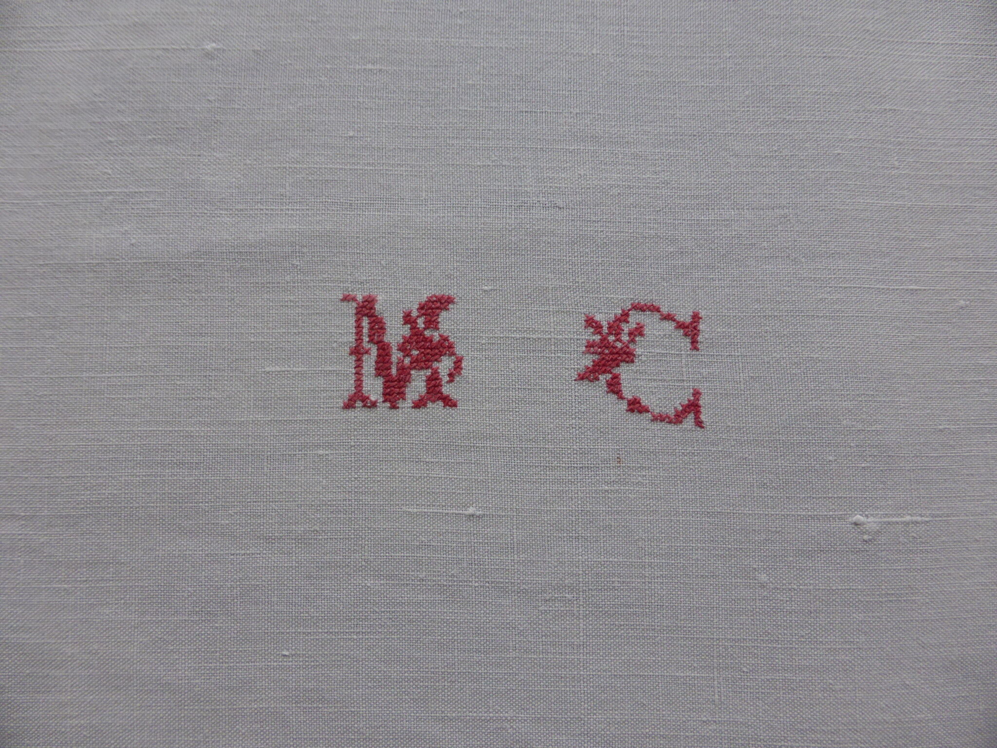 9 old linen towels embroidered MC with red thread