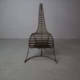 Set of three sculptural iron chairs