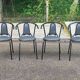 4 vintage bistro chairs in steel and grey leather from the 1980s.