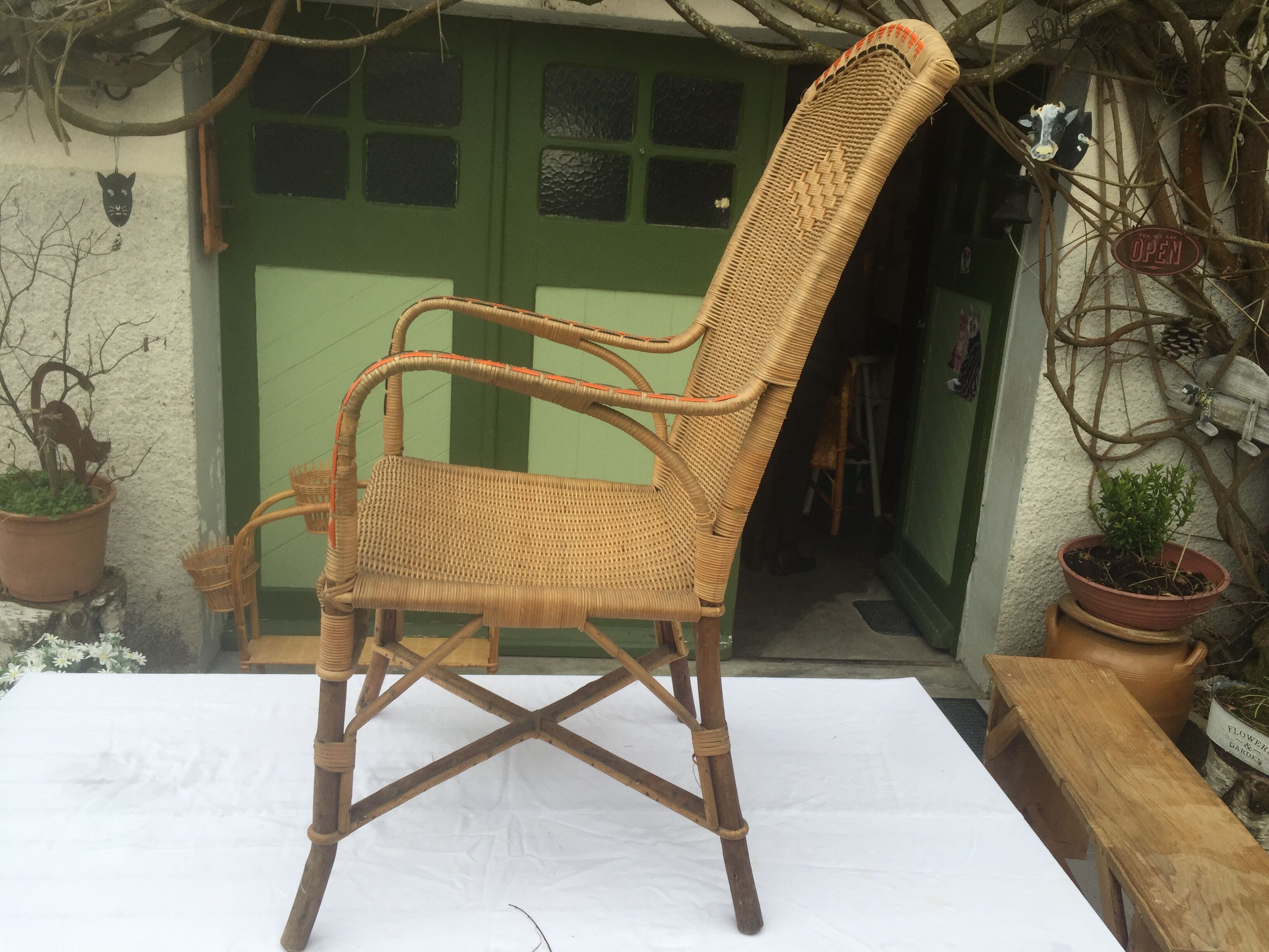 Red vintage décor rattan armchair
