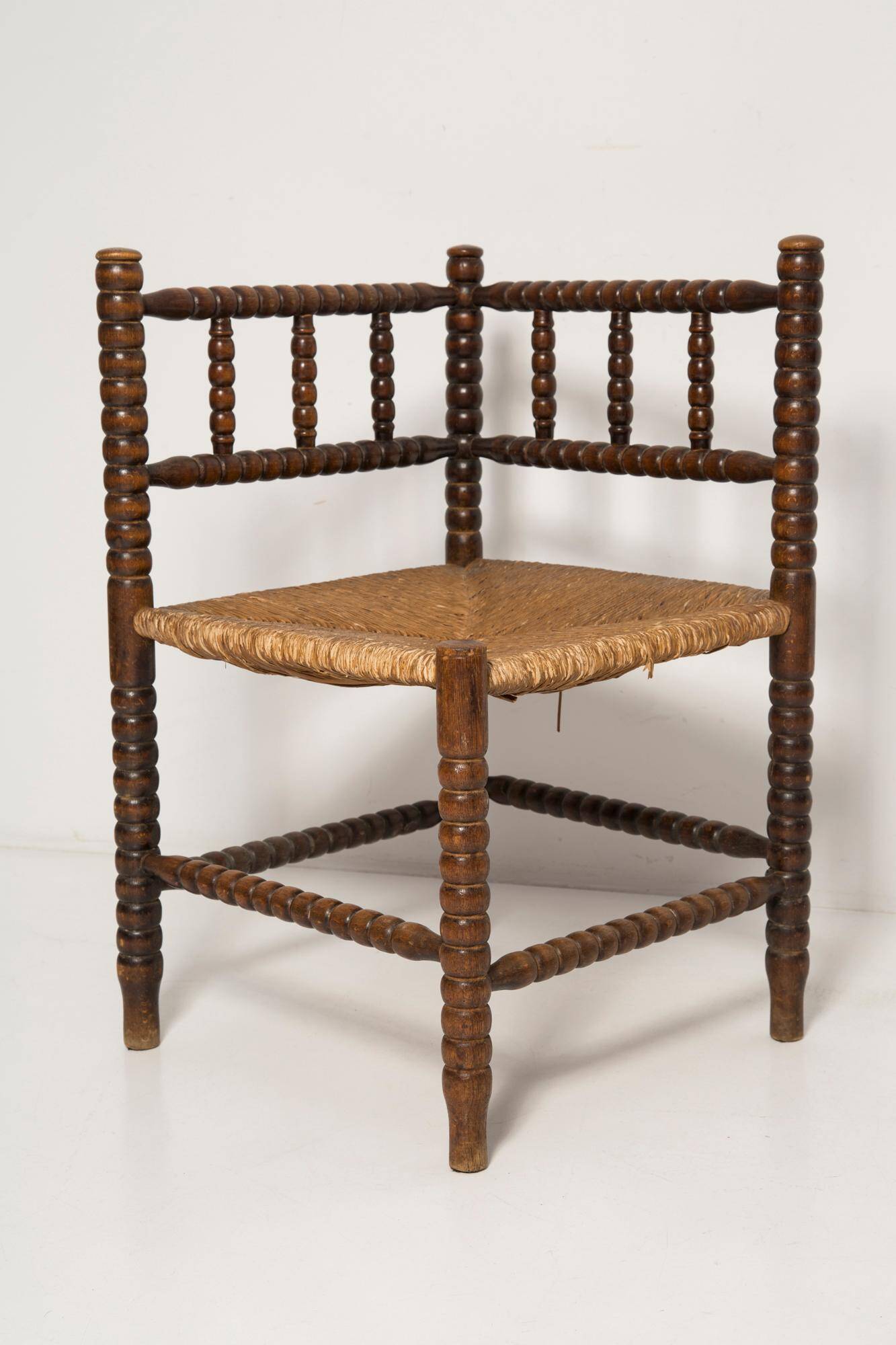 Provincial antique bobbin corner chair from the mid-century, France, 1940s.
