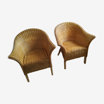 Pair of two light rattan chairs