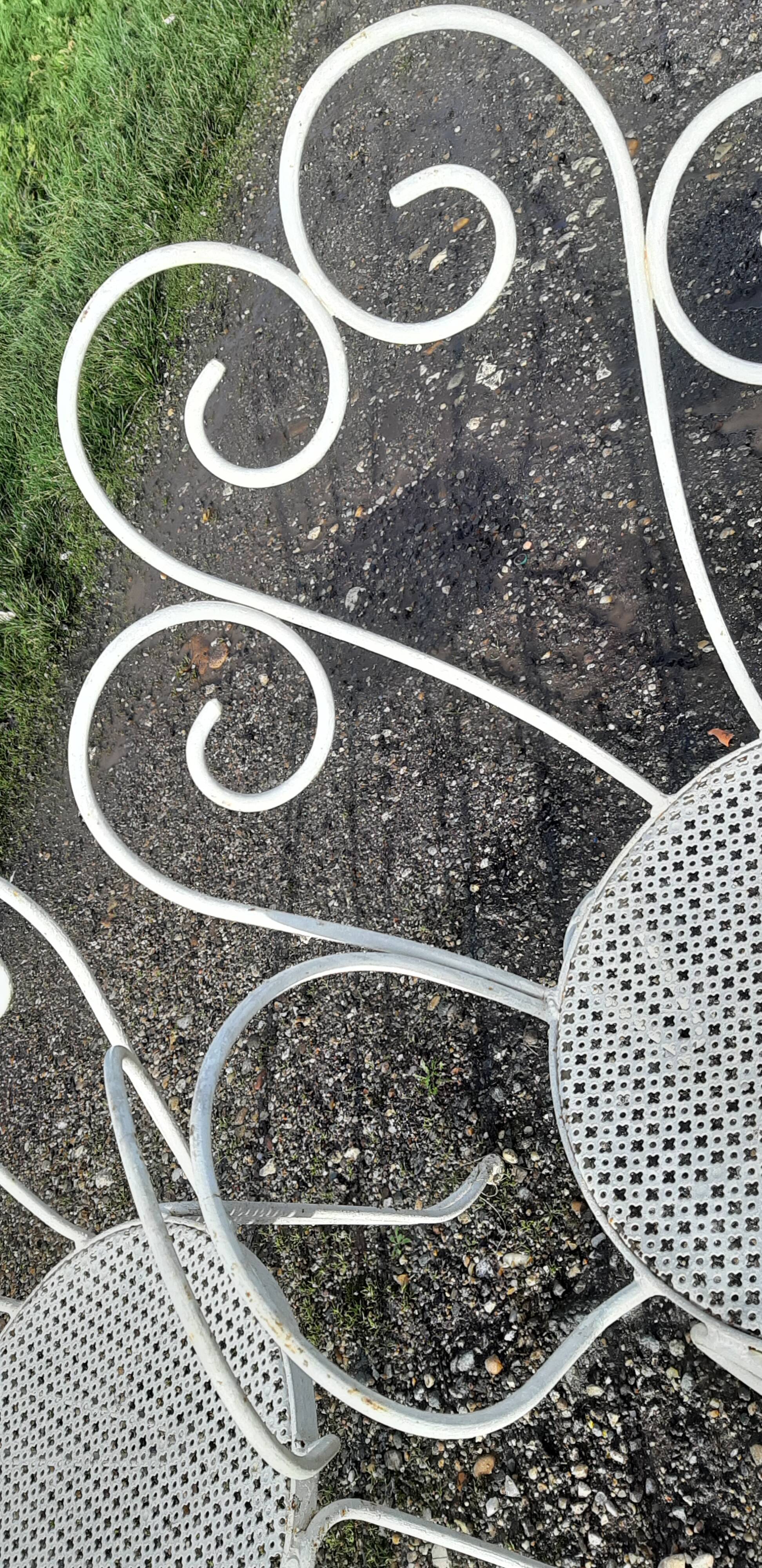 Paire de fauteuils de jardin 1900 en fer forgé