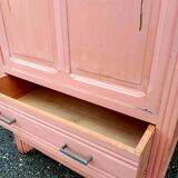 Old pink Parisian cabinet with painted decor