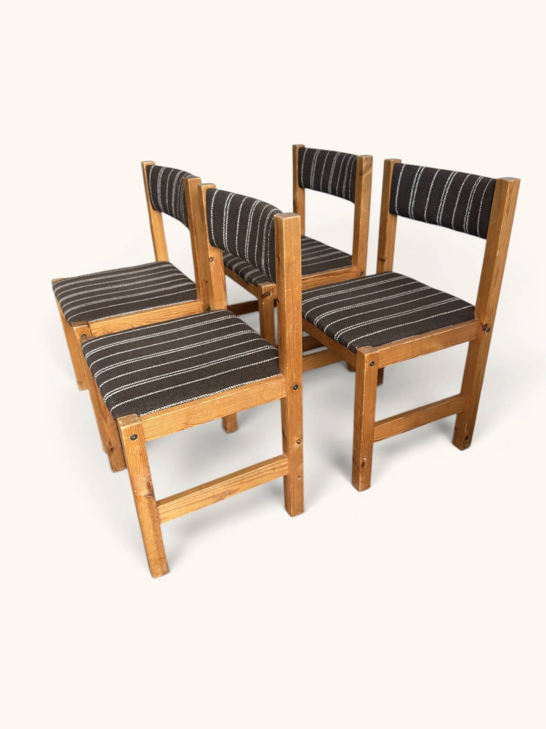 Set of 4 Danish dining chairs with brown striped upholstery.