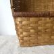 Woven rattan basket, for placing or hanging.