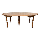 Round cherry wood table, 6 feet, Louis Philippe style with 2 extensions.