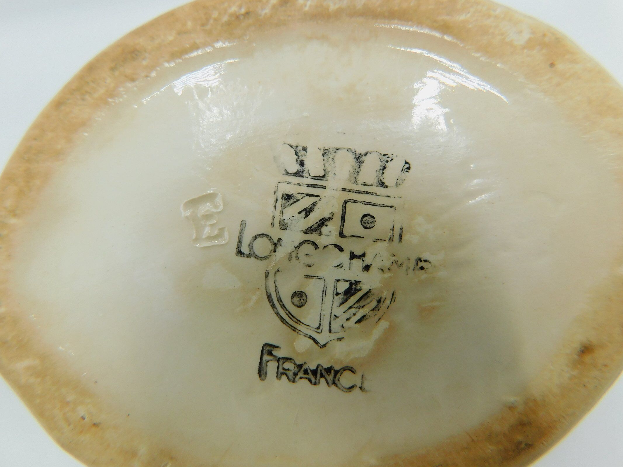 Longchamp ivory and gold saucière