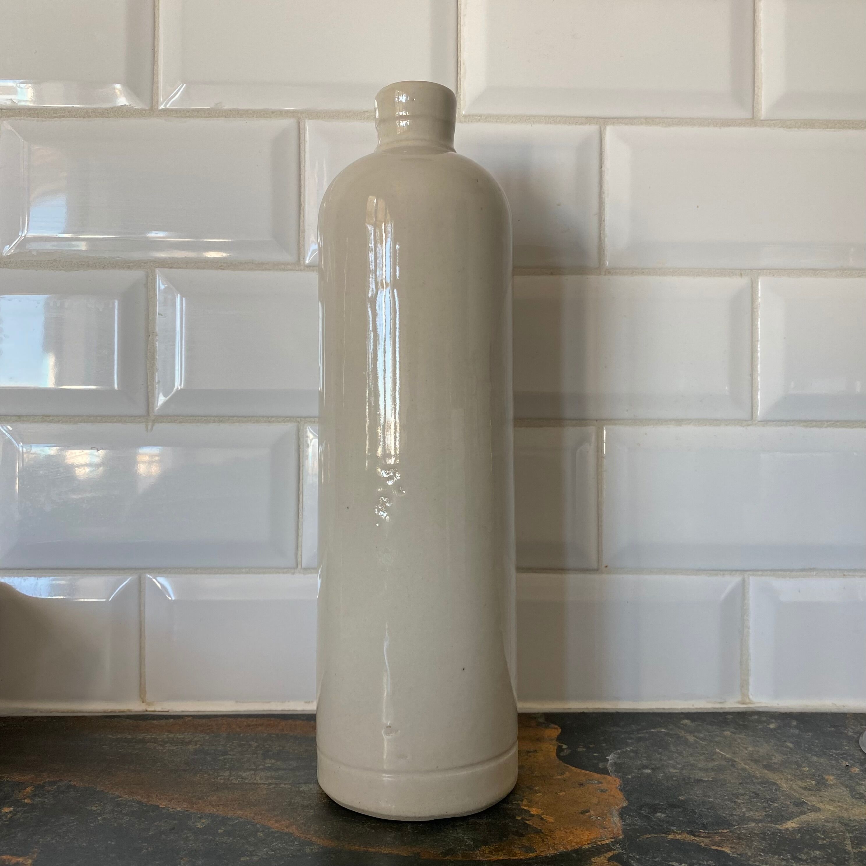Bottle in stoneware soliflore